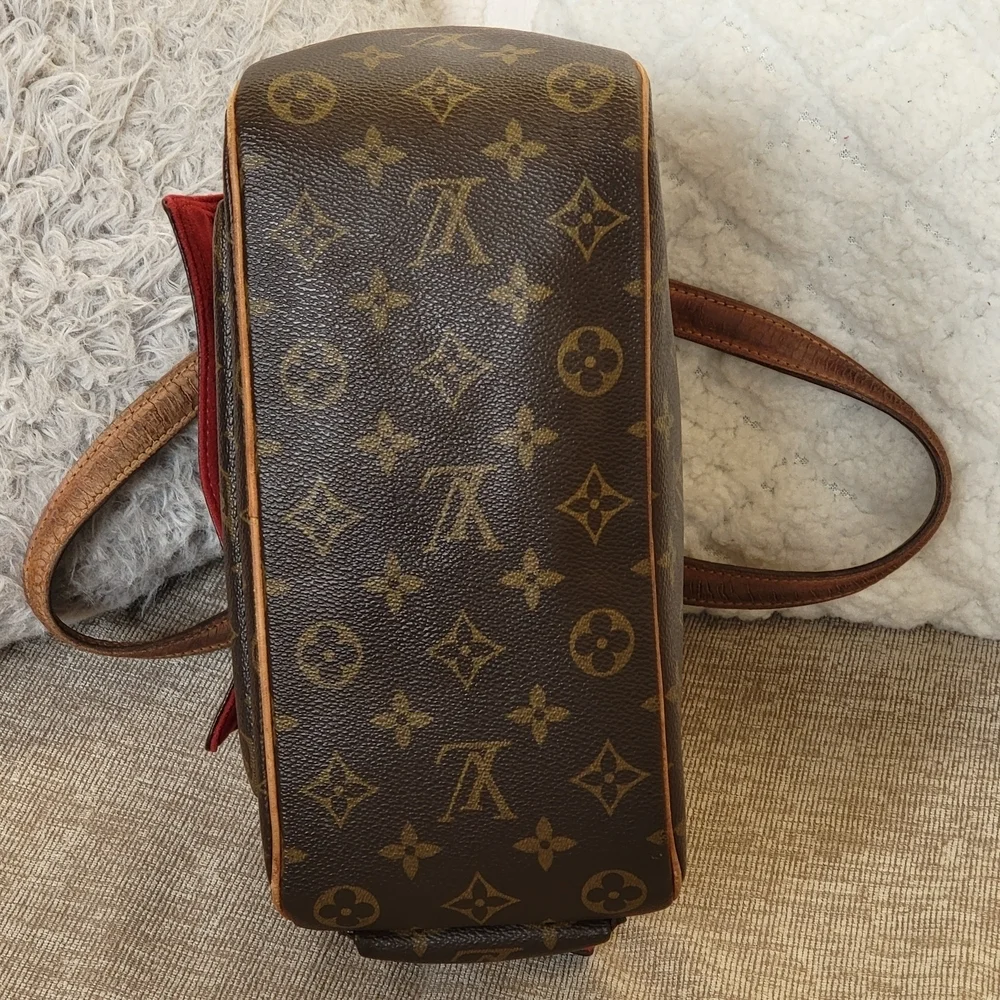 Louis Vuitton Excentri-Cite Handbag Monogram..Authentic. w/COA